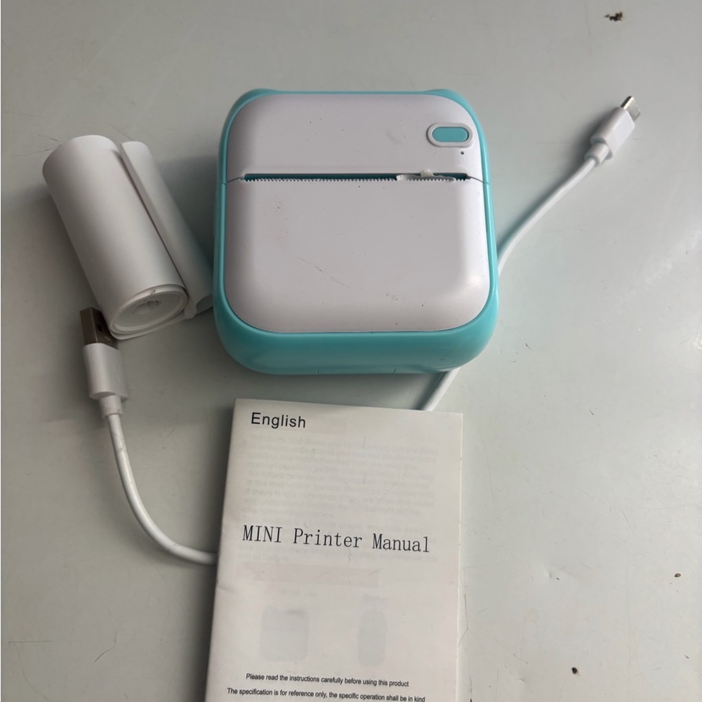 Compact Blue and White Mini Printer pocket size